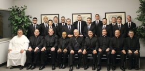 Bishop Thomas J. Tobin, center, gathered on Sept. 6 with the priest faculty of the Seminary of Our Lady of Providence for a photo with the 13 seminarians currently enrolled in this year’s class, including six from the diocese, as OLP marked the opening of the 2022-2023 academic year. Bishop Tobin celebrated Mass in the seminary’s chapel before joining the seminarians for dinner. PHOTO: COLE DESANTIS